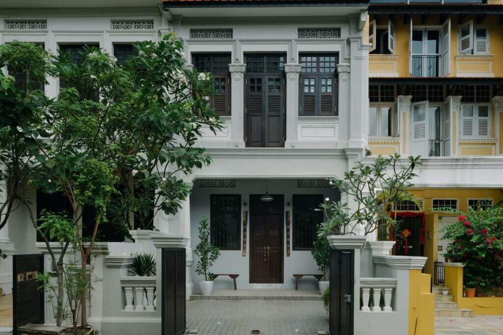 condo vs shophouse living